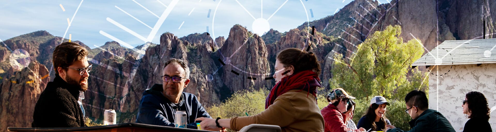 people sitting at an outdoor table
